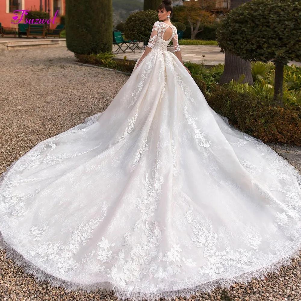 Fsuzwel New Design Scoop Neck Beaded Half Sleeve A-Line Wedding Dress 2019 Lace Royal Train Princess Bride Gown Vestido de Noiva
Fsuzwel New Design Scoop Neck Beaded Half Sleeve A-Line Wedding Dress 2019 Lace Royal Train Princess Bride Gown Vestido de Noiva