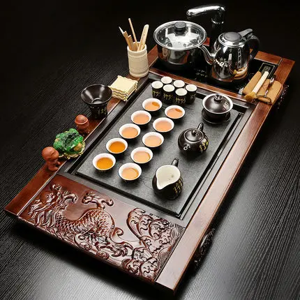 Kung Fu Purple Sand Tea set Teapot Teacups Ceramic Set Simple Household Solid Wood Tea Tray Automatic Kettle Teatable
Kung Fu Purple Sand Tea set Teapot Teacups Ceramic Set Simple Household Solid Wood Tea Tray Automatic Kettle Teatable
