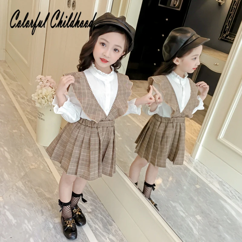 Girls Suit With Plain Color Blouse+plaid Braces Skirt Fashion Baby Costume Toddler Kid Skirt 2 Piece Set Children's Clothing set
Girls Suit With Plain Color Blouse+plaid Braces Skirt Fashion Baby Costume Toddler Kid Skirt 2 Piece Set Children's Clothing set