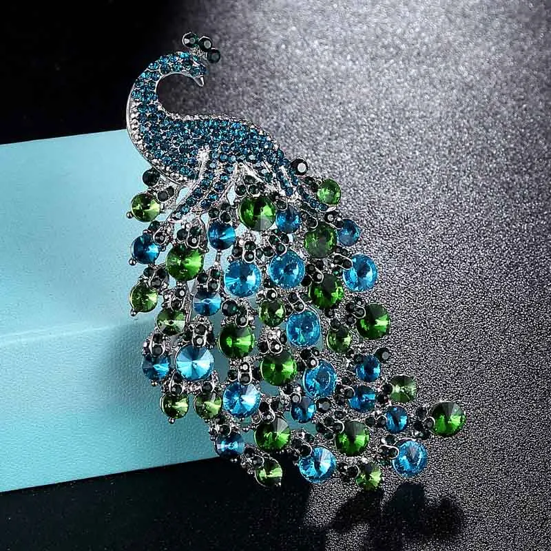 Zlxgirl jewelry big size rhinestone crystal peacock wedding brooches jewelry women's bridal scarf pins animal hijab pins broches
Zlxgirl jewelry big size rhinestone crystal peacock wedding brooches jewelry women's bridal scarf pins animal hijab pins broches