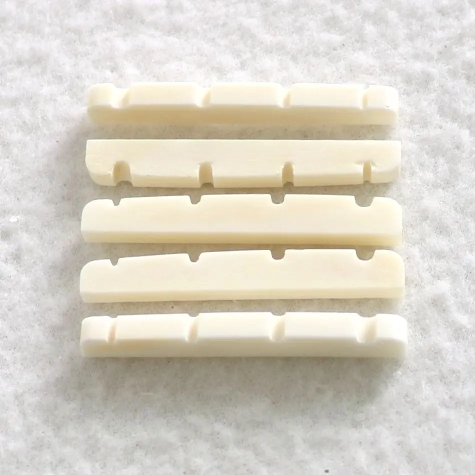 Sell Free Shipping 5pcs/Pack Bone Bass Nut 42mm for 4 String Pbass Necks 
Sell Free Shipping 5pcs/Pack Bone Bass Nut 42mm for 4 String Pbass Necks