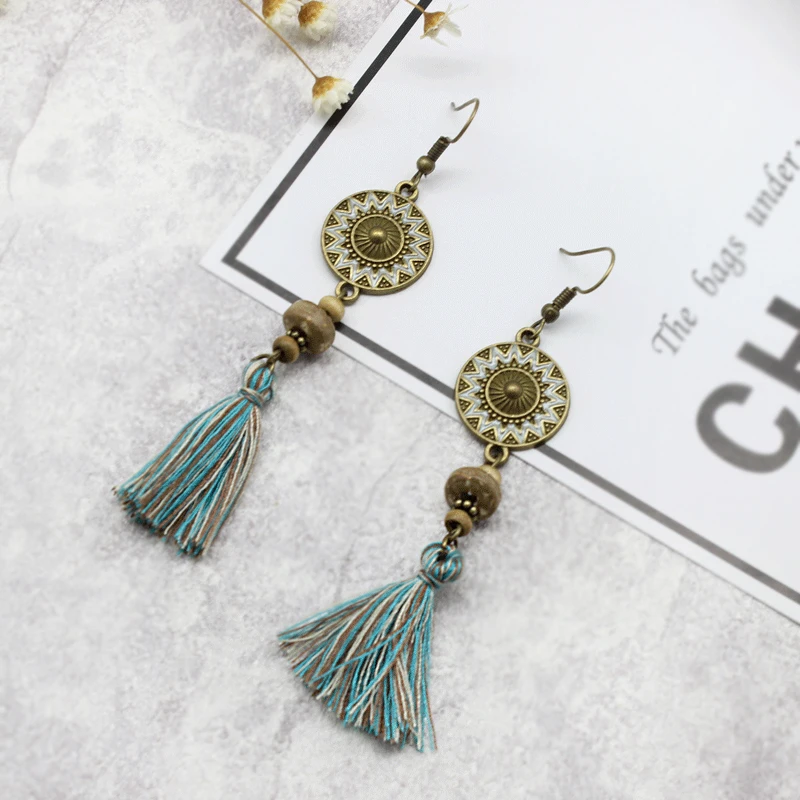 Bohemian Bronze Handmade Earrings Sunflower National Totem Colorful Silk Thread Tassel String Stone Pendant Retro Ladies Jewelry
Bohemian Bronze Handmade Earrings Sunflower National Totem Colorful Silk Thread Tassel String Stone Pendant Retro Ladies Jewelry