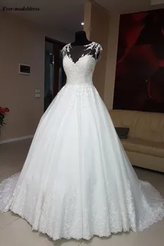 Modest 2019 Wedding Dresses Lace Appliques Sheer O-Neck Illusion Back Sweep Train A-Line Plus Size Bridal Gowns Vestido de noiva
Modest 2019 Wedding Dresses Lace Appliques Sheer O-Neck Illusion Back Sweep Train A-Line Plus Size Bridal Gowns Vestido de noiva