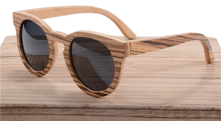 Vintage Round wood sun glasses real handmade wooden Retro cat eye sunglasses women brand designer polarized eyewear UV400 z68005
Vintage Round wood sun glasses real handmade wooden Retro cat eye sunglasses women brand designer polarized eyewear UV400 z68005