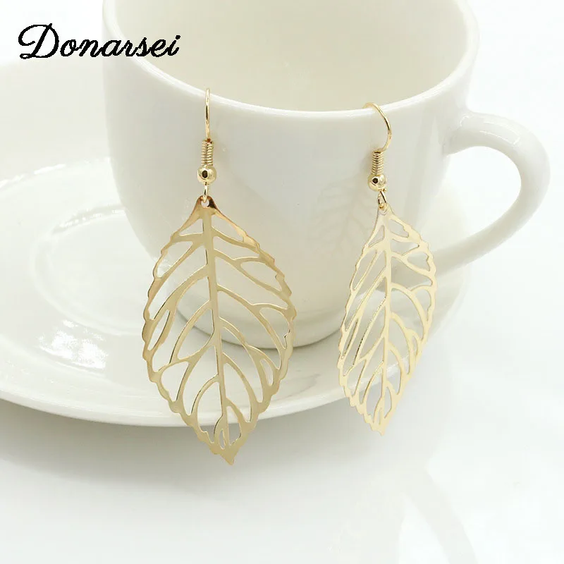 Donarsei Minimalist Hollow Leaves Drop Earrings For Women Fashion Fish Shape Dangling Earrings Gold Metal Star Earrings Gift
Donarsei Minimalist Hollow Leaves Drop Earrings For Women Fashion Fish Shape Dangling Earrings Gold Metal Star Earrings Gift