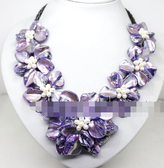 huij 001549 fashion Purple shell white pearl bead shell flower pendant necklace 18"long
huij 001549 fashion Purple shell white pearl bead shell flower pendant necklace 18"long