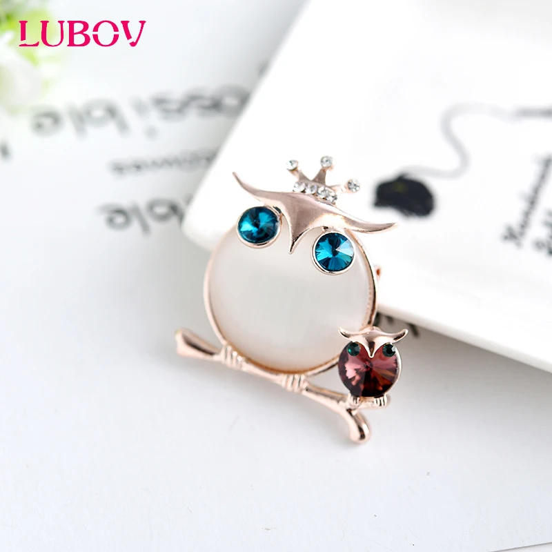 LUBOV Blue Crystal Eyes Gold Color Metal Owl Brooch Pin with Rhinestone Inlaid Crown Luxury Women Party Costume Jewelry 2019
LUBOV Blue Crystal Eyes Gold Color Metal Owl Brooch Pin with Rhinestone Inlaid Crown Luxury Women Party Costume Jewelry 2019