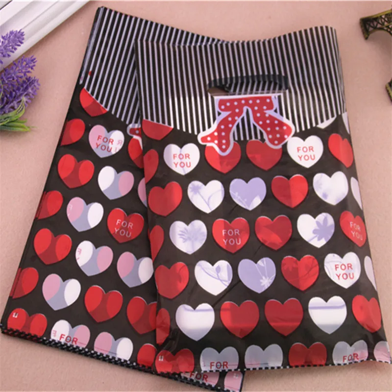 2016 New Design Wholesale 100pcs/lot 20*30cm Colorful Sweet Heart Plastic Shopping Bags With Handle Gift Packaging Bags
2016 New Design Wholesale 100pcs/lot 20*30cm Colorful Sweet Heart Plastic Shopping Bags With Handle Gift Packaging Bags