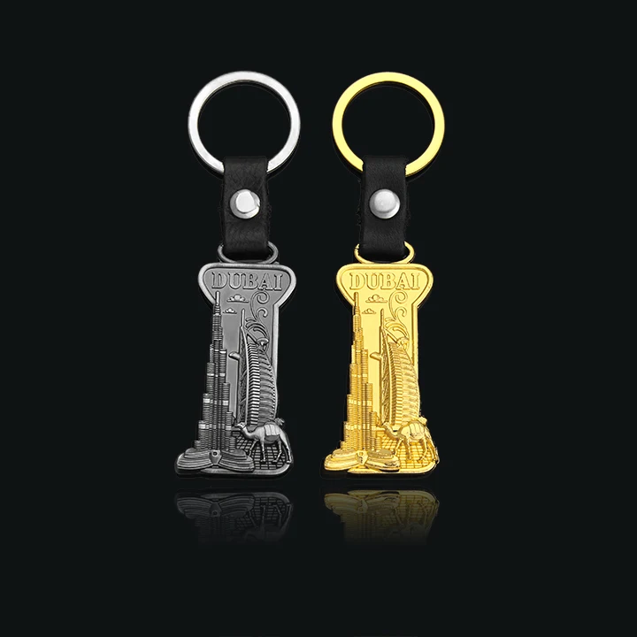 A gold and silver double color key buckle engraved with landmark building in Dubai
A gold and silver double color key buckle engraved with landmark building in Dubai