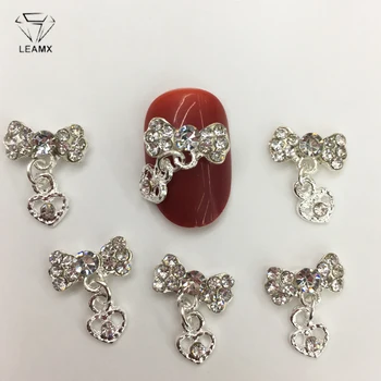 LEAMX 10 PCS/bag Bow With Drop Nails Art Decorations 3D Bow Rhinestone Metal Nail Jewelry Accessory DIY Shining Tips Decor L438
LEAMX 10 PCS/bag Bow With Drop Nails Art Decorations 3D Bow Rhinestone Metal Nail Jewelry Accessory DIY Shining Tips Decor L438
