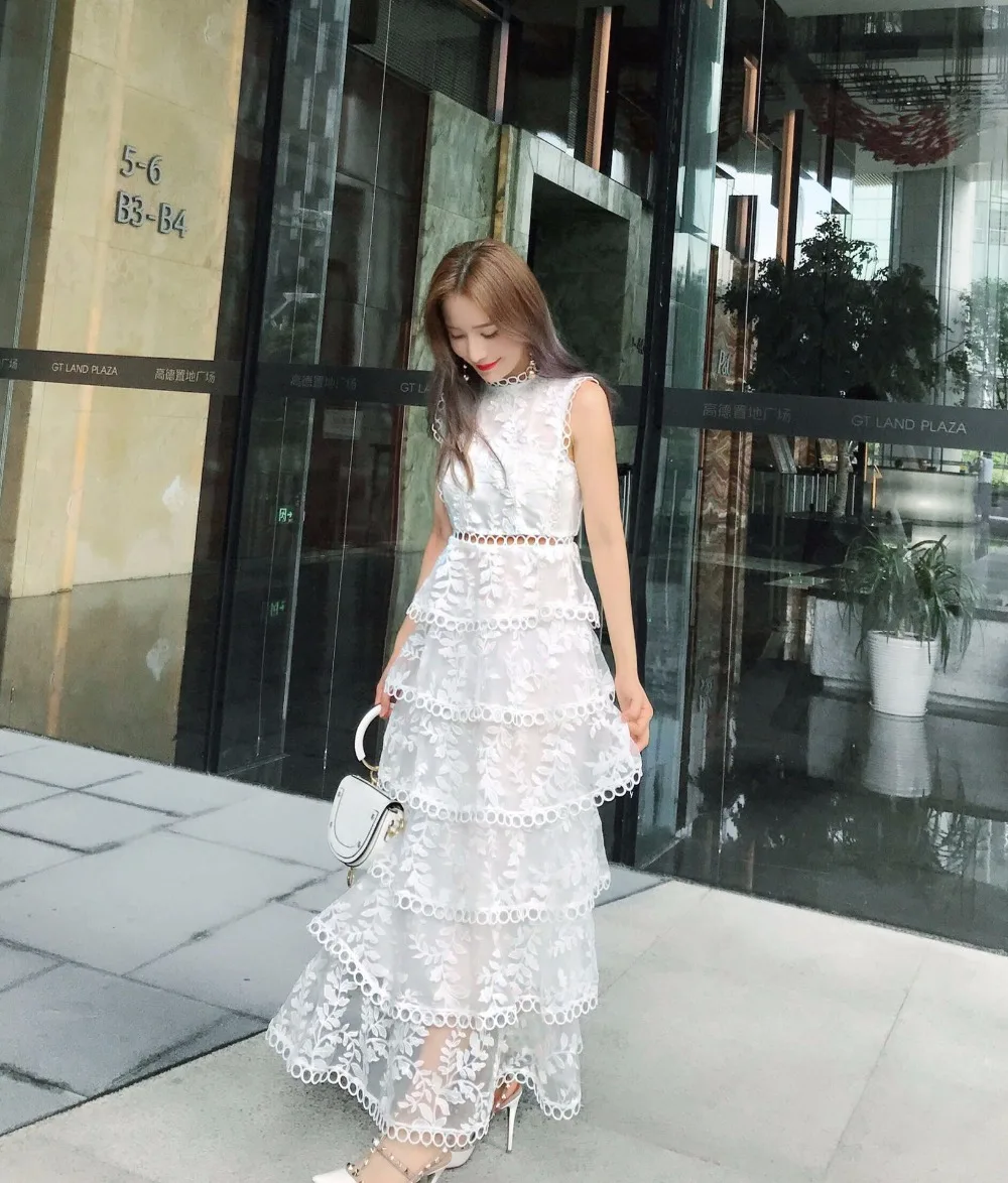 High-end summer heavywork organza leaves embroidery hollow out white sexy sleeveless long maxi elegant lady ruffle floral dress
High-end summer heavywork organza leaves embroidery hollow out white sexy sleeveless long maxi elegant lady ruffle floral dress