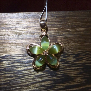 New genuine 18K gold precision inlaid Russia Green Jade cat eye pendant necklace
New genuine 18K gold precision inlaid Russia Green Jade cat eye pendant necklace