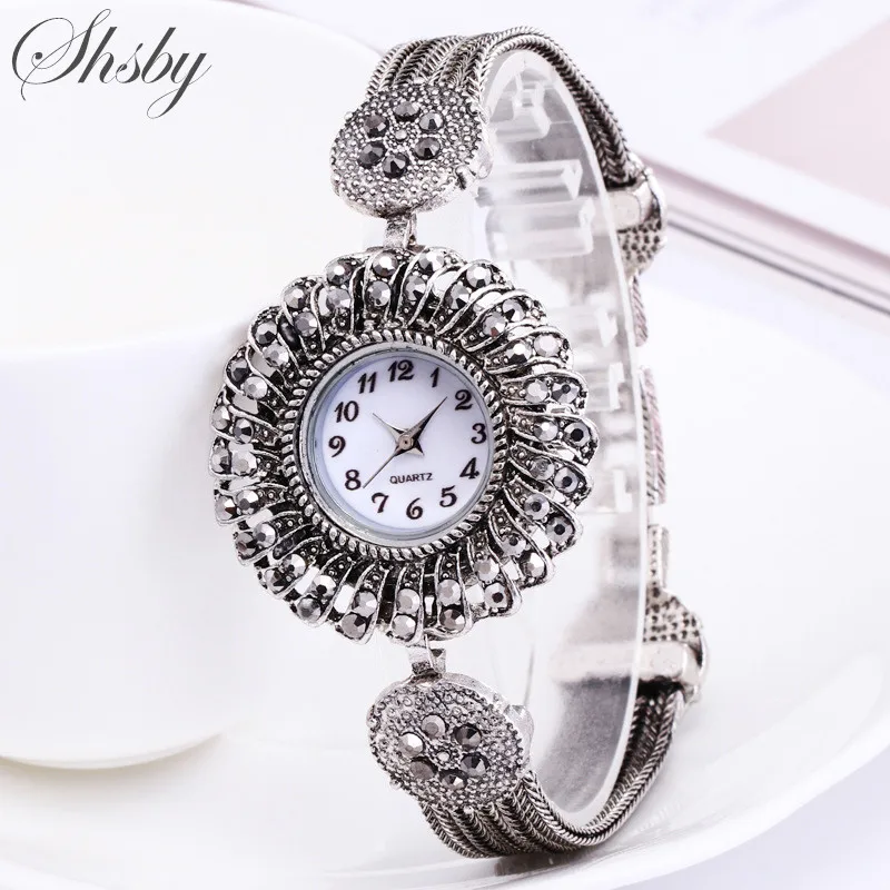 Shsby women Jewelry Watches Casual Quartz Bracelet Watch lady flower Rhinestone Clock Women Luxury Crystal Dress Wristwatches
Shsby women Jewelry Watches Casual Quartz Bracelet Watch lady flower Rhinestone Clock Women Luxury Crystal Dress Wristwatches