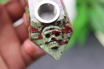 

96 grams of natural quartz crystal flower green stone carving head bone canal smoking