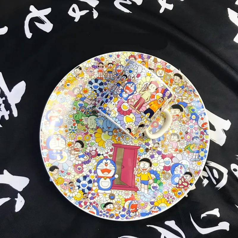 2Pcs/set KAWS Takashi Murakami Sun Flower Doraemon OriginalFake Dish Mug Ceramic Cup Plate Set Desktop Decor Ornaments R998
2Pcs/set KAWS Takashi Murakami Sun Flower Doraemon OriginalFake Dish Mug Ceramic Cup Plate Set Desktop Decor Ornaments R998