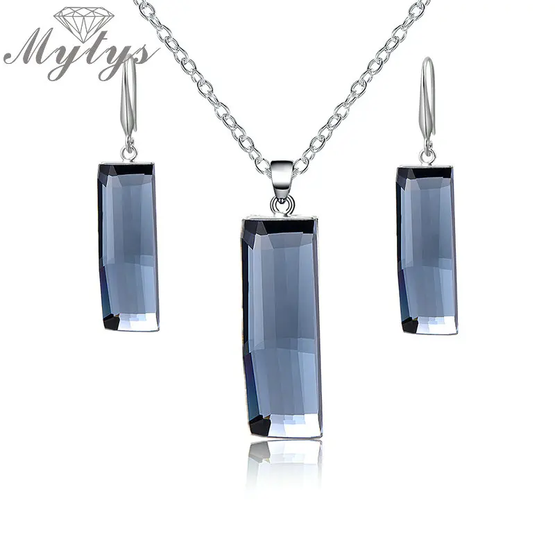 Mytys Modern City Fashion Geometric Square Grey Crystal Dangle Earring and Pendant Necklace Jewelry Sets for Women CN338 CE38
Mytys Modern City Fashion Geometric Square Grey Crystal Dangle Earring and Pendant Necklace Jewelry Sets for Women CN338 CE38