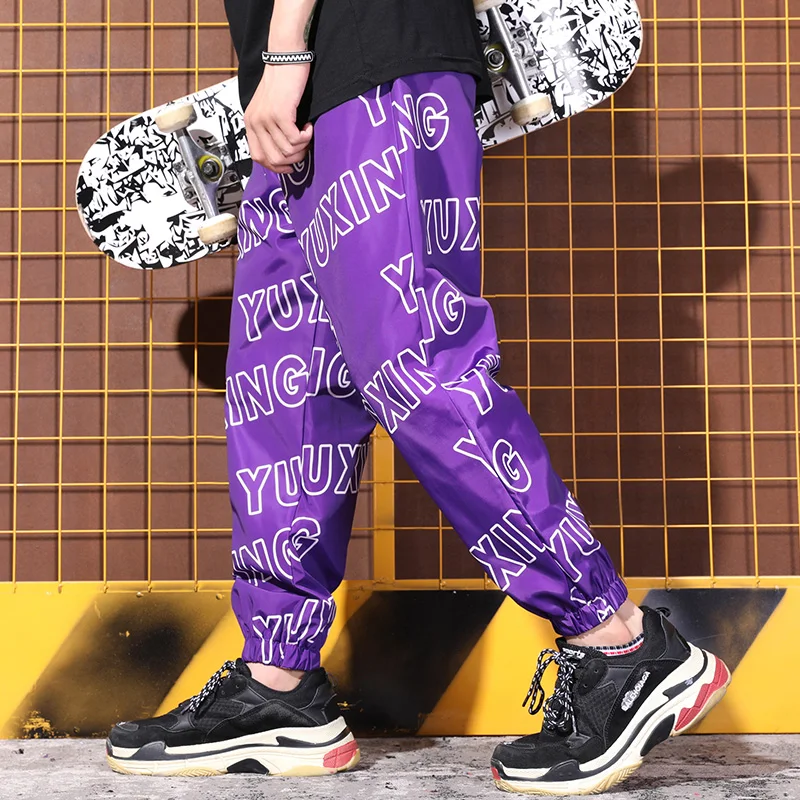 Hip-hop country youth hiphop loose letter male tightness nine feet trousers
Hip-hop country youth hiphop loose letter male tightness nine feet trousers