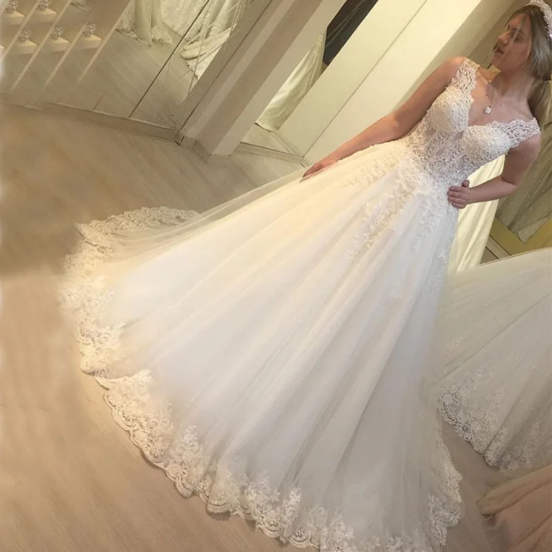 2019 Elegant A Line Wedding Dresses V-neck Sleeves Appliques Heavy Beading Bridal Gowns Floor Length White Ivory Wedding Gowns
2019 Elegant A Line Wedding Dresses V-neck Sleeves Appliques Heavy Beading Bridal Gowns Floor Length White Ivory Wedding Gowns