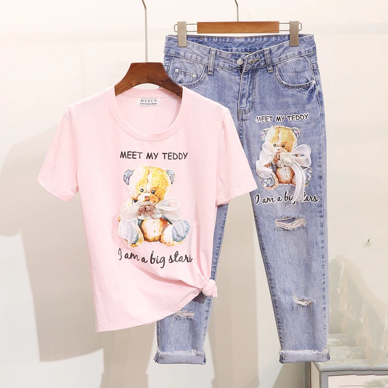 New Spring Summer Fashion Women Sets Sequins Cartoon Bear Print Short Sleeve T-shirt + Hole Denim Pants Female Jeans Suits
New Spring Summer Fashion Women Sets Sequins Cartoon Bear Print Short Sleeve T-shirt + Hole Denim Pants Female Jeans Suits