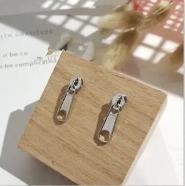 e 10 Korean version of the fashion simple personality zipper head studs female personality jewelry accessories factory direct
e 10 Korean version of the fashion simple personality zipper head studs female personality jewelry accessories factory direct