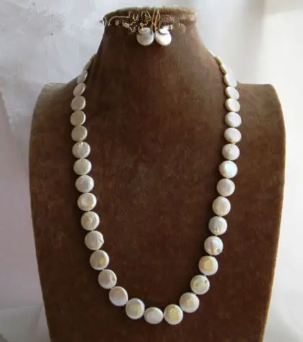 SHIPPING HOT sell new Style >>>>24'' 14mm White Coin Freshwater Pearl Earring Necklace Set
SHIPPING HOT sell new Style >>>>24'' 14mm White Coin Freshwater Pearl Earring Necklace Set