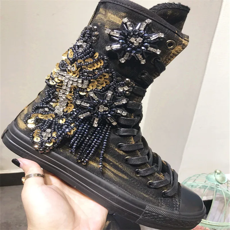 Original homemade new heavy work beaded sequins graffiti long tube increased canvas shoes Thai tide shoes single boots
Original homemade new heavy work beaded sequins graffiti long tube increased canvas shoes Thai tide shoes single boots