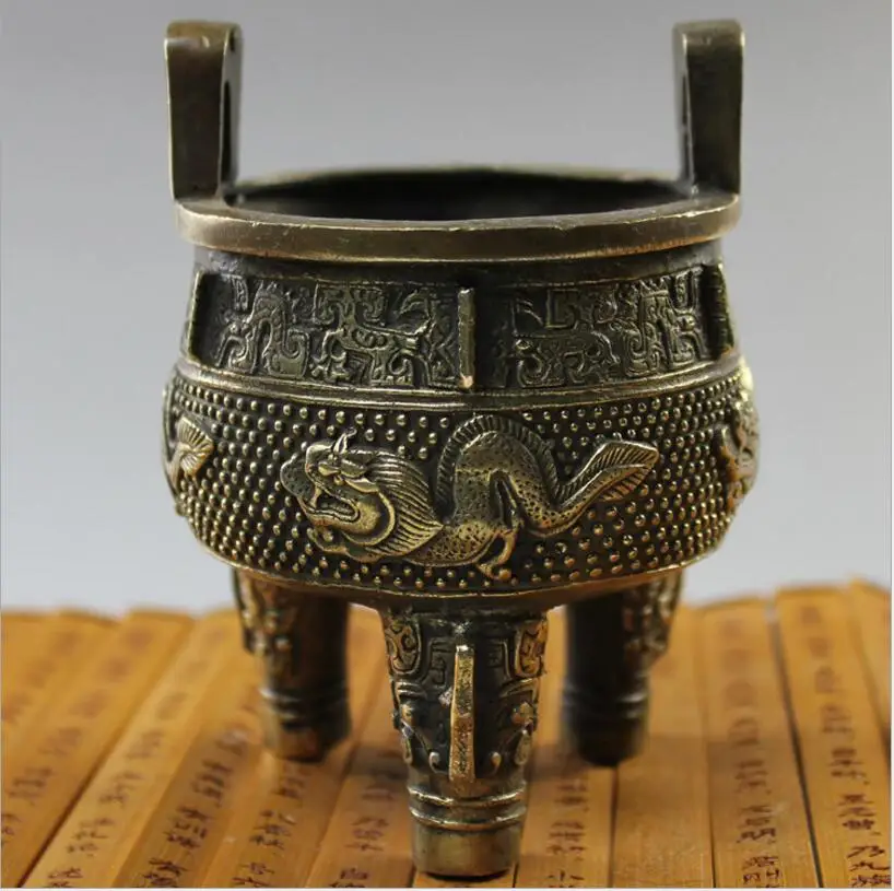 Chinese style tripod authoritative copper incense sandalwood Home Decoration creative crafts Cheap Flavor furnace shipping
Chinese style tripod authoritative copper incense sandalwood Home Decoration creative crafts Cheap Flavor furnace shipping