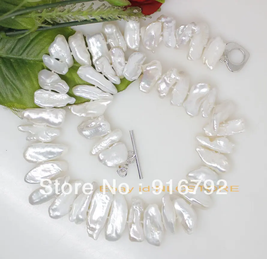 free P&P *****genuine natural white Biwa pearl strand necklace fashion jewelry stone
free P&P *****genuine natural white Biwa pearl strand necklace fashion jewelry stone