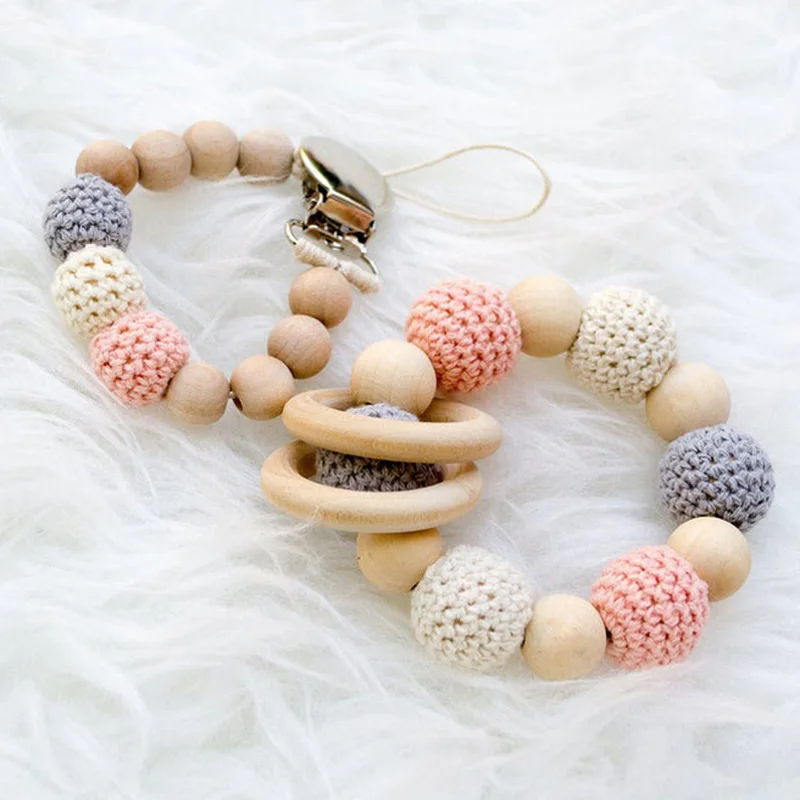 Organic Wood Bead Pacifier Clip Crochet Beads Wood Ring Baby Teething Bracelet Ring for Dummy Feeding
Organic Wood Bead Pacifier Clip Crochet Beads Wood Ring Baby Teething Bracelet Ring for Dummy Feeding