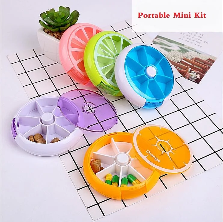 Mini cute suitcase round 7 sub-grid button rotating medicine box portable one week packing kit
Mini cute suitcase round 7 sub-grid button rotating medicine box portable one week packing kit
