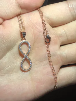 Brand 925 Silver & rose gold Infinity Pendant Number eight 8 Necklaces Full Shiny AAAAA Cubic Zircon New Fashion Women Jewelry
Brand 925 Silver & rose gold Infinity Pendant Number eight 8 Necklaces Full Shiny AAAAA Cubic Zircon New Fashion Women Jewelry