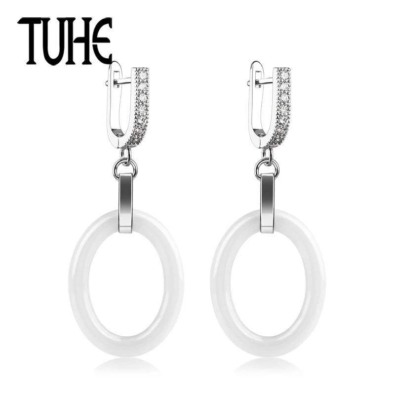 TUHE 2018 Simple Style Elegant White Ceramic Hollow Round Rhinestone Drop Earrings For Women Lady Wedding Party Fashion Jewelry
TUHE 2018 Simple Style Elegant White Ceramic Hollow Round Rhinestone Drop Earrings For Women Lady Wedding Party Fashion Jewelry