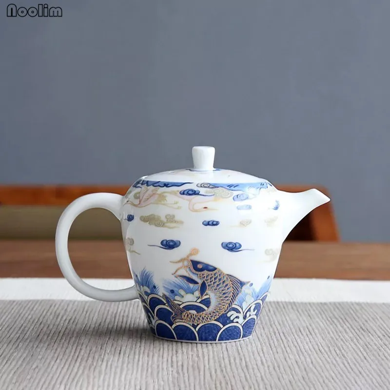 NOOLIM Hand-painted Auspicious Arowana Ceramic Teapot Home Kung Fu Tea Set Handmade Filter Tea Pot Teaware Accessories
NOOLIM Hand-painted Auspicious Arowana Ceramic Teapot Home Kung Fu Tea Set Handmade Filter Tea Pot Teaware Accessories