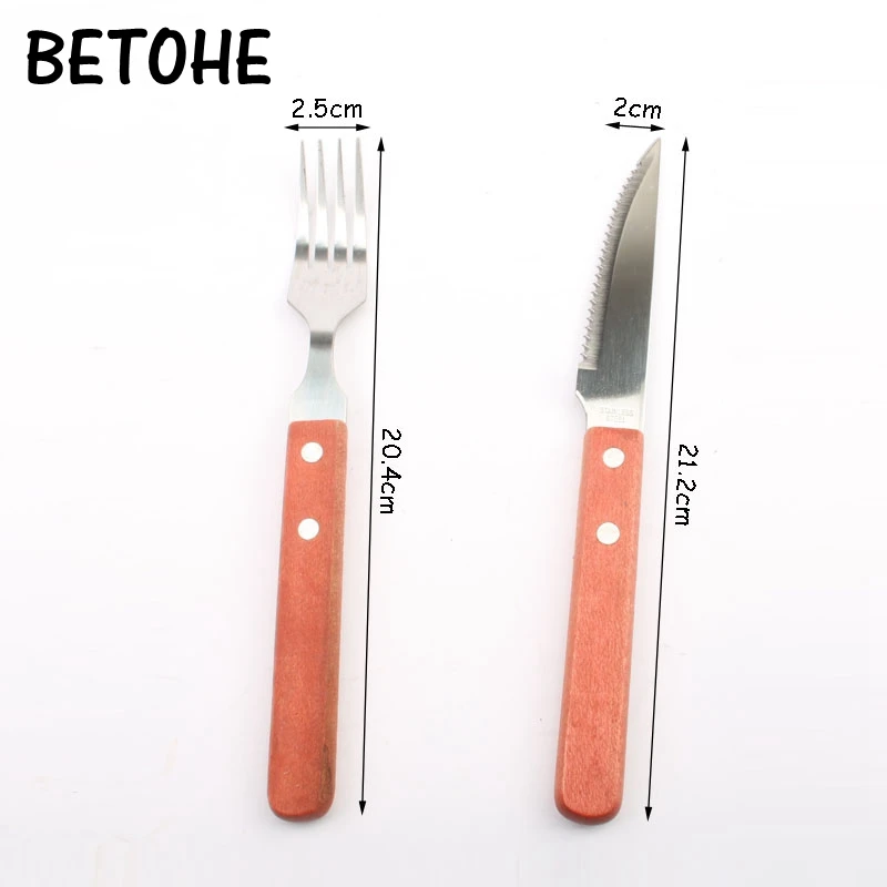 Wood handle knife and fork 1 sets of stainless steel Western tableware to eat steak knife and fork two-piece suit restaurant
Wood handle knife and fork 1 sets of stainless steel Western tableware to eat steak knife and fork two-piece suit restaurant