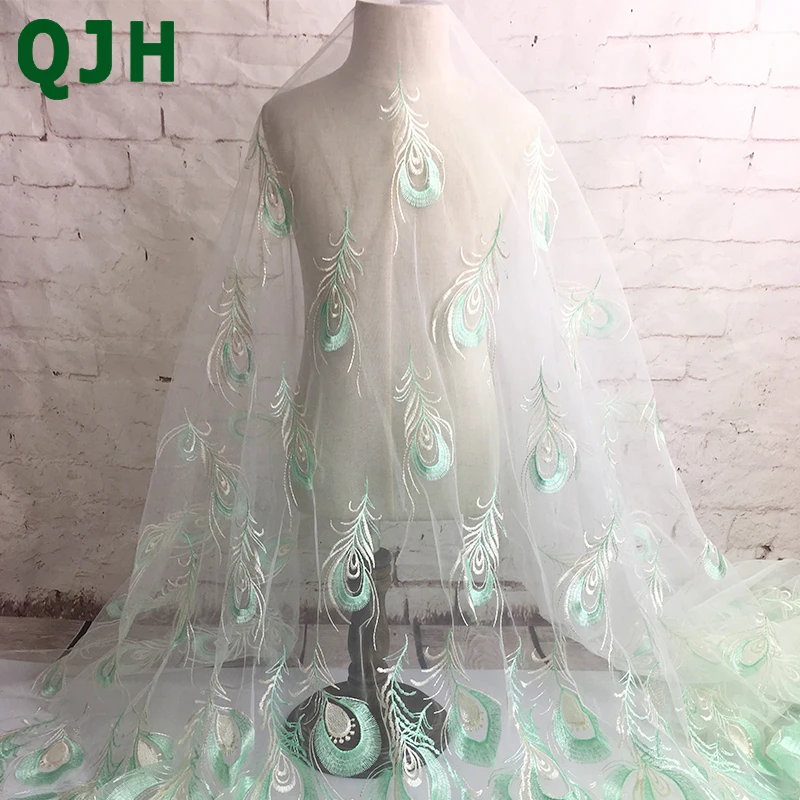 Latest 1yard African Tulle Swiss Voile Lace Fabrics White Green Peacock Feather Pattern Embroidered Skirt Cloth Dress Accessory
Latest 1yard African Tulle Swiss Voile Lace Fabrics White Green Peacock Feather Pattern Embroidered Skirt Cloth Dress Accessory