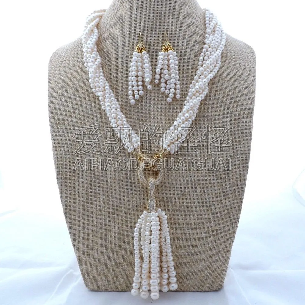 Women's 7 Strands 22" White Pearl Necklace CZ Pendant Earrings Sets 
Women's 7 Strands 22" White Pearl Necklace CZ Pendant Earrings Sets