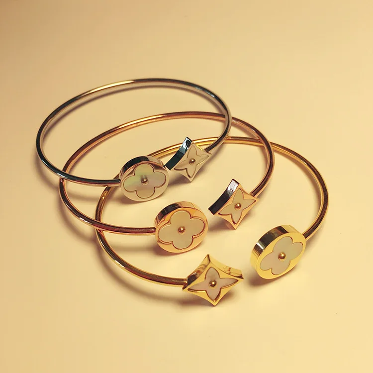 Exquisite round square flower cross with natural white fritilla-open titanium steel bracelet for women
Exquisite round square flower cross with natural white fritilla-open titanium steel bracelet for women