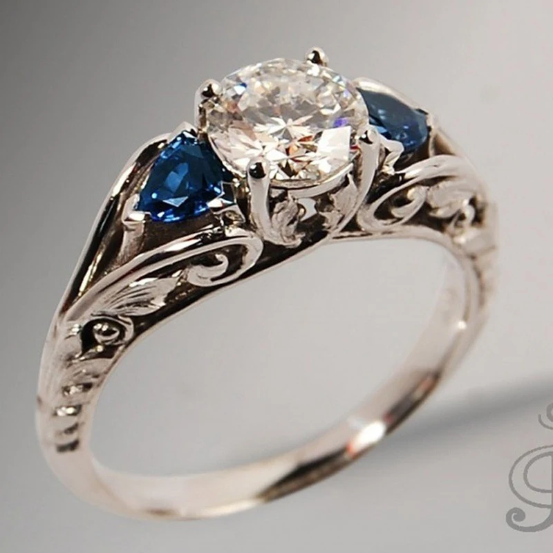 Double Fair Vintage Pattern Blue Stone Four Claws Zircon White Gold Color Engagement Rings For Women Fashion Jewelry KBR110
Double Fair Vintage Pattern Blue Stone Four Claws Zircon White Gold Color Engagement Rings For Women Fashion Jewelry KBR110