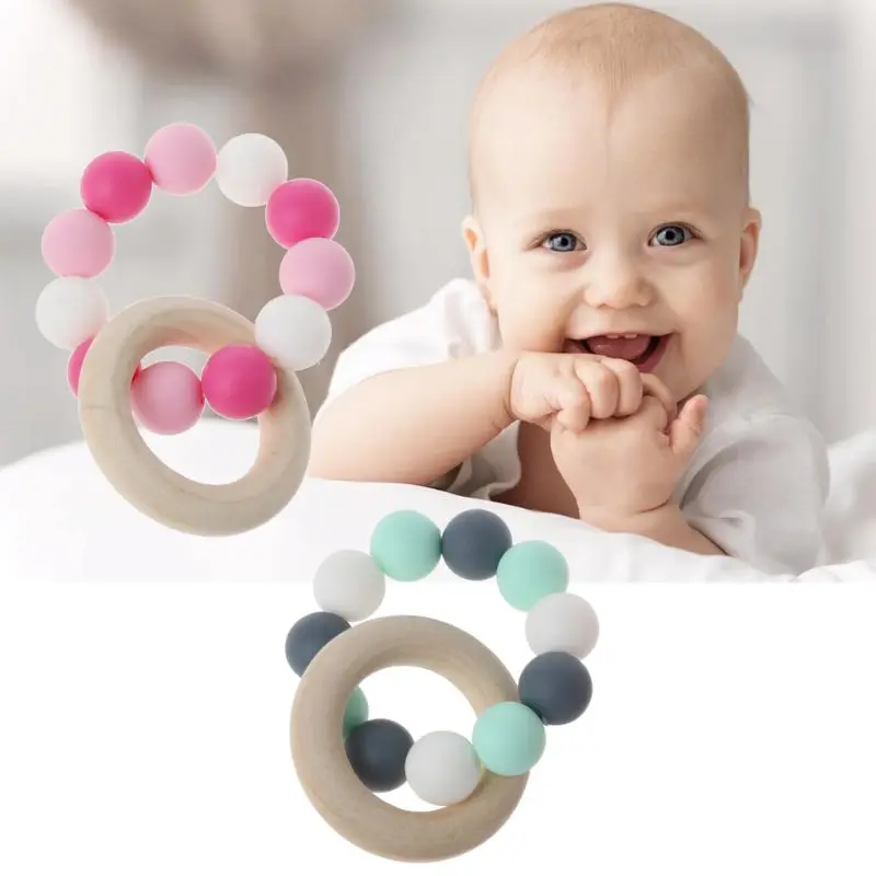 Baby Nursing Bracelets Wooden Teether Silicone Chew Beads Teething Rattles Toys Teether Montessori Bracelets
Baby Nursing Bracelets Wooden Teether Silicone Chew Beads Teething Rattles Toys Teether Montessori Bracelets