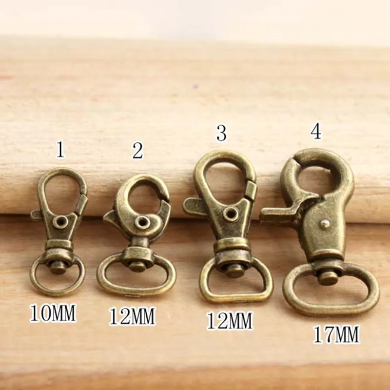 10mm Zinc Alloy bronze Buckles Bag Parts Accessories Luggage bag buckle Tongs Snap hook spring Clasp 20pcs/lot
10mm Zinc Alloy bronze Buckles Bag Parts Accessories Luggage bag buckle Tongs Snap hook spring Clasp 20pcs/lot