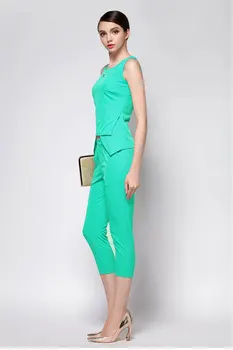 Women green sleeve shirt and calf length pants
Women green sleeve shirt and calf length pants