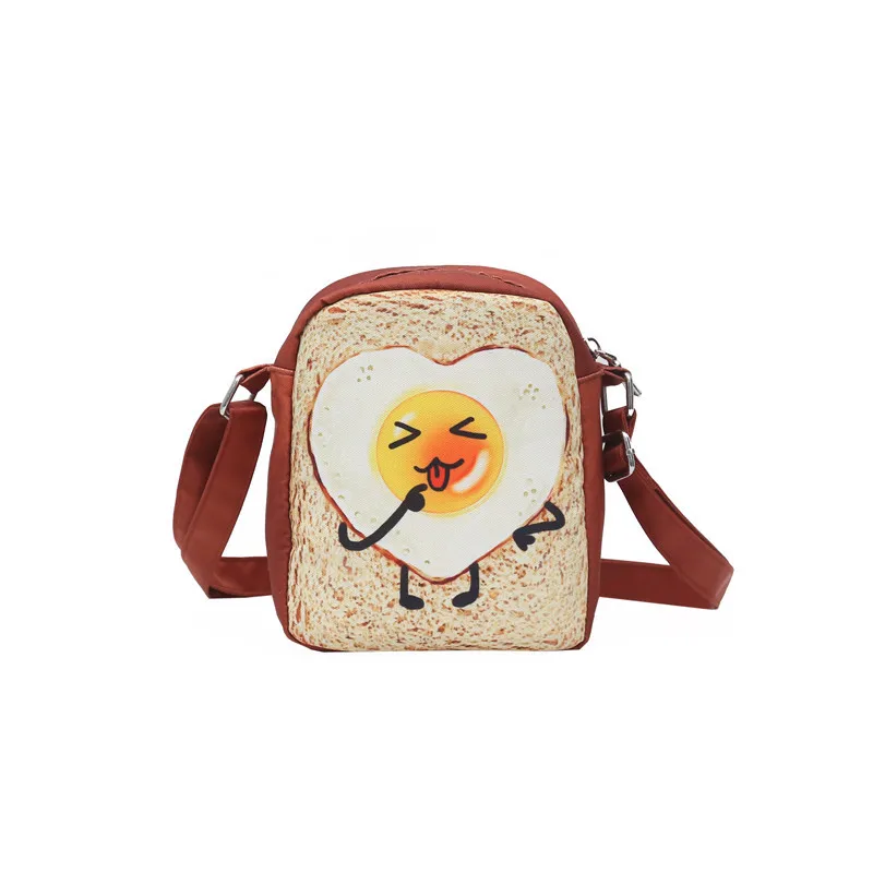 Funny shape bread eggs women handbag Simple wild diagonal canvas bag female shoulder cartoon bag girl Messenger Bag
Funny shape bread eggs women handbag Simple wild diagonal canvas bag female shoulder cartoon bag girl Messenger Bag