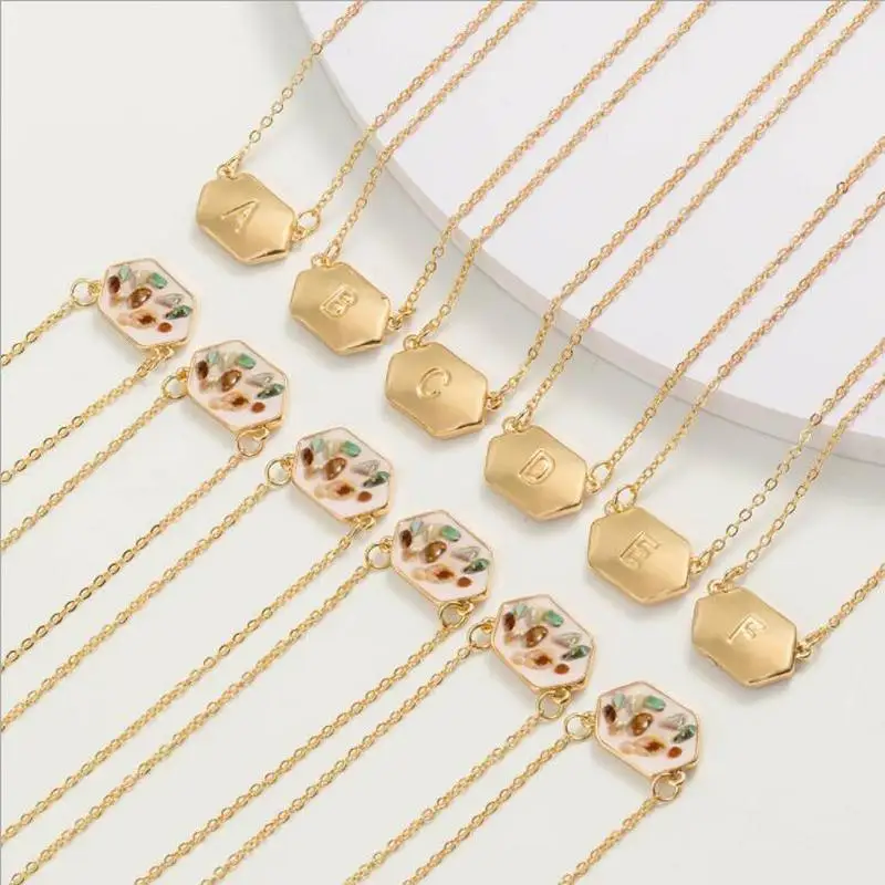 Double Sided 26 Letters A To Z White Hexagon White Resin Shell Gold Metal Color Necklace Geometric Body Women Jewelry
Double Sided 26 Letters A To Z White Hexagon White Resin Shell Gold Metal Color Necklace Geometric Body Women Jewelry