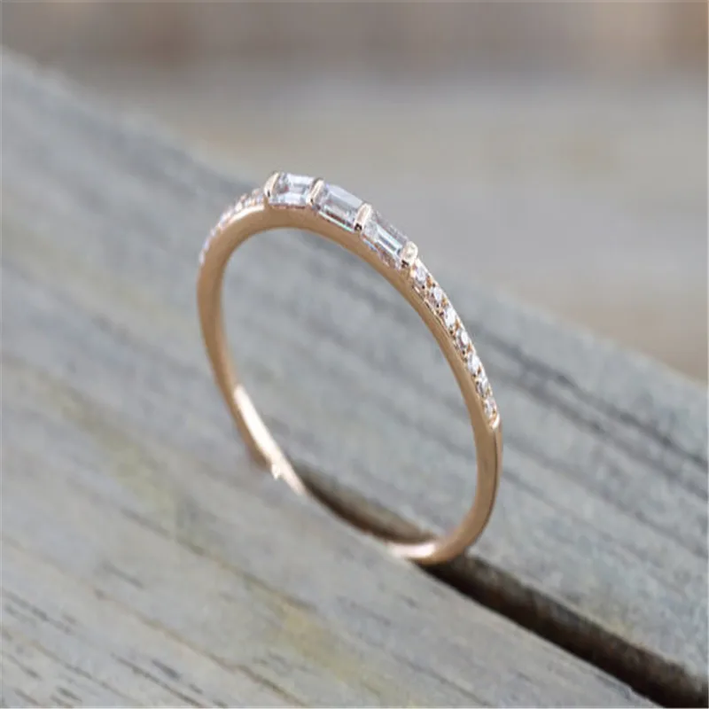 Rose Gold color Round Brilliant And Baguette Cut Crystal Ring Engagement Wedding Band Promise Fashion Design Stackable Stacking
Rose Gold color Round Brilliant And Baguette Cut Crystal Ring Engagement Wedding Band Promise Fashion Design Stackable Stacking