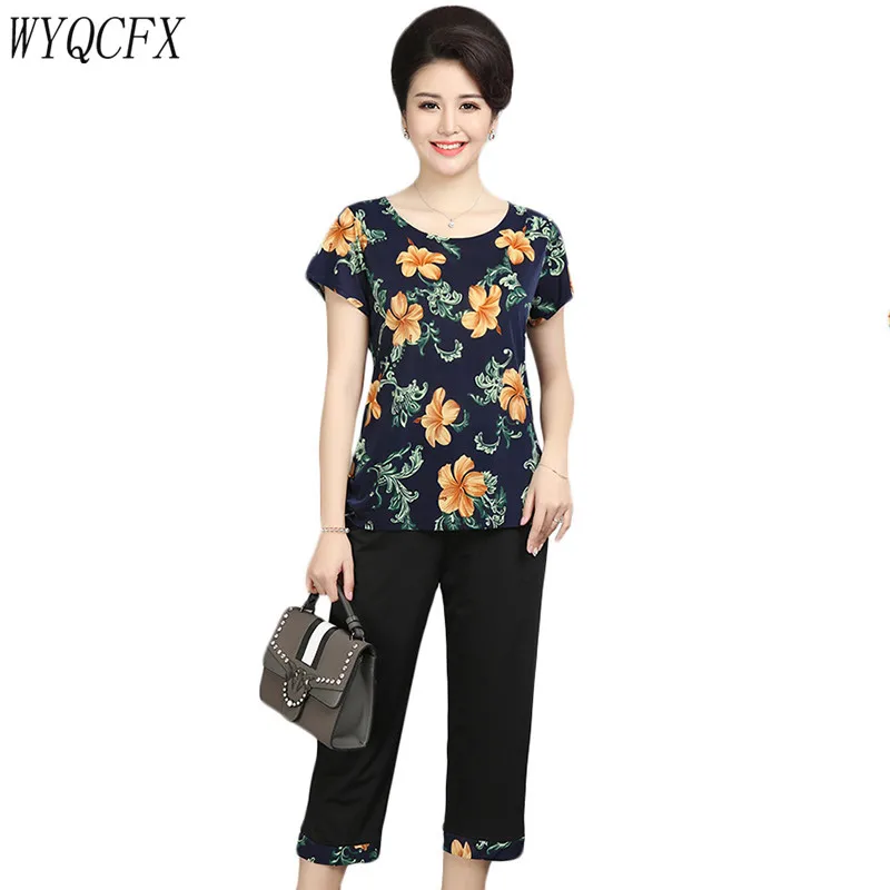 Plus Size 4XL Summer Two Piece Set Women Milk Silk Print Short Sleeve T-shirt Pants Middle Aged Casual Loose Elegant Suit W404
Plus Size 4XL Summer Two Piece Set Women Milk Silk Print Short Sleeve T-shirt Pants Middle Aged Casual Loose Elegant Suit W404