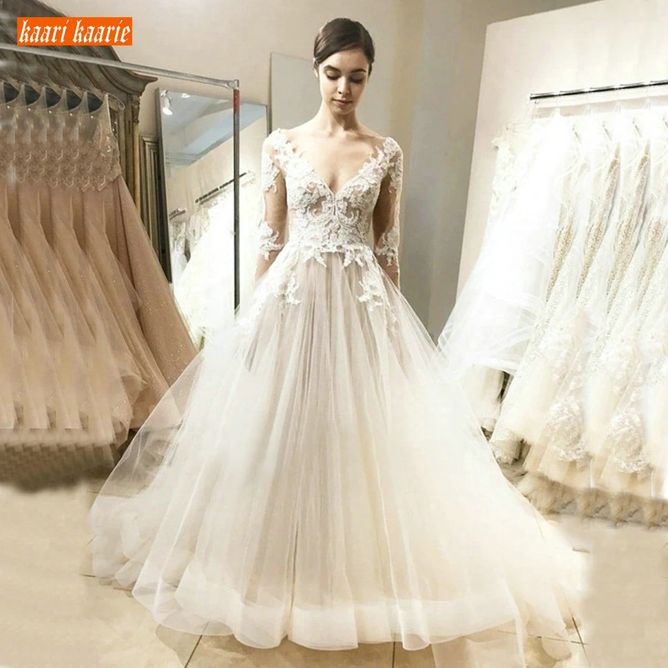 Luxury Boho White V Neck Wedding Dress Lace Appliqued Pageant Tulle Beach Wedding Gowns Long Sleeves Custom Made Bridal Dresses
Luxury Boho White V Neck Wedding Dress Lace Appliqued Pageant Tulle Beach Wedding Gowns Long Sleeves Custom Made Bridal Dresses