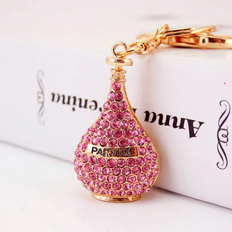 New WaterdropTrinket Rhinestone Perfume Bottle Keychain Alloy Car Keyring Charm Women Handbag Key Ring Holder Bag Accessory
New WaterdropTrinket Rhinestone Perfume Bottle Keychain Alloy Car Keyring Charm Women Handbag Key Ring Holder Bag Accessory