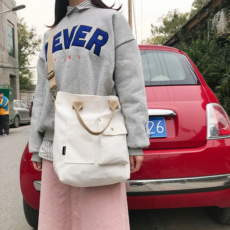 New Japanese and Korean Art Bag Fashion Ulzzang Canvas Shoulder Bag Casual Lady Tote Bag Broadband Messenger Bag
New Japanese and Korean Art Bag Fashion Ulzzang Canvas Shoulder Bag Casual Lady Tote Bag Broadband Messenger Bag