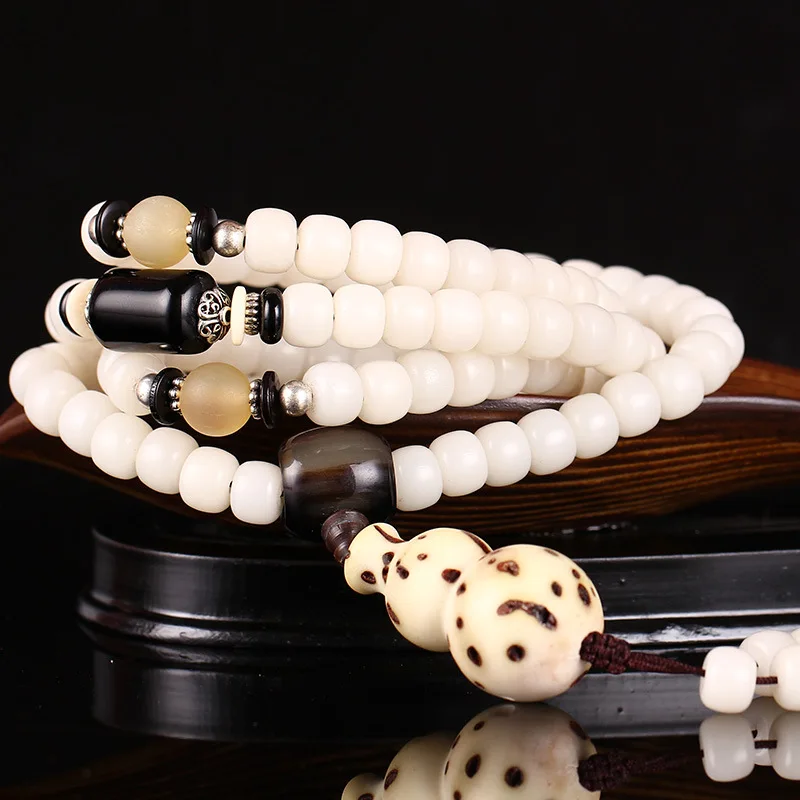 Hainan white Bodhi root 108 Beads Bracelet Obsidian thousand eyes Bodhi hand on a white Bodhi beads
Hainan white Bodhi root 108 Beads Bracelet Obsidian thousand eyes Bodhi hand on a white Bodhi beads
