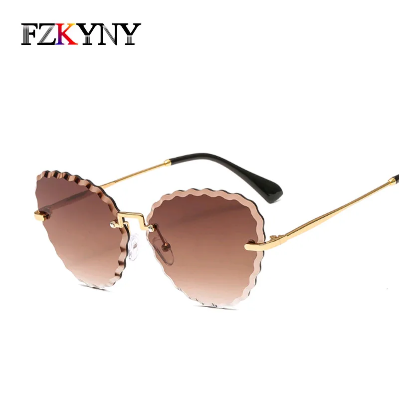 FZKTNY Newest Rimless Trimmed Sunglasses Women Luxury Brand Designer Golden Metal Frame Beautiful Marine Lenses Shopping Eyewear 
FZKTNY Newest Rimless Trimmed Sunglasses Women Luxury Brand Designer Golden Metal Frame Beautiful Marine Lenses Shopping Eyewear